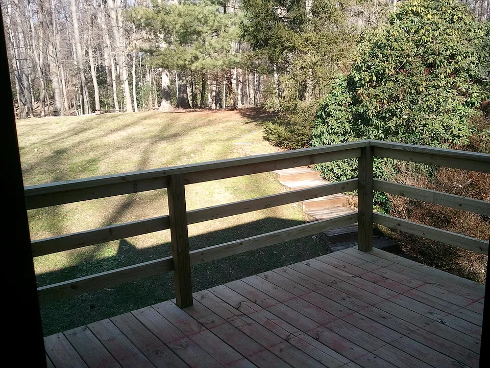 Entry Deck with stairs not visible on right that lead to driveway