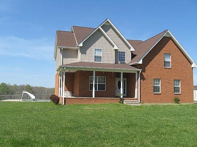 front of home on 7.24 acres