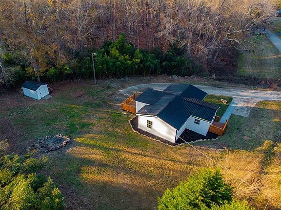 Aerial view - note fire pit on left and storage shed