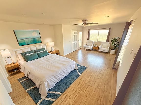 Furnished Master Bedroom with walk in closet and full bath