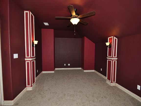 Also upstairs is the 'vintage-themed' dedicated media room