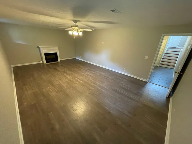 Large bonus room on the first floor can be a large office, media room, or a 4th bedroom