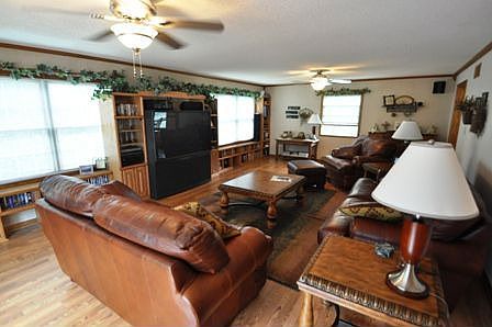 Living Room - this large room can accommodate your family's needs...and then some