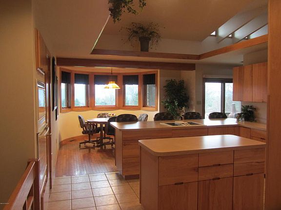 kitchen has lots of counter area and ceramic floors