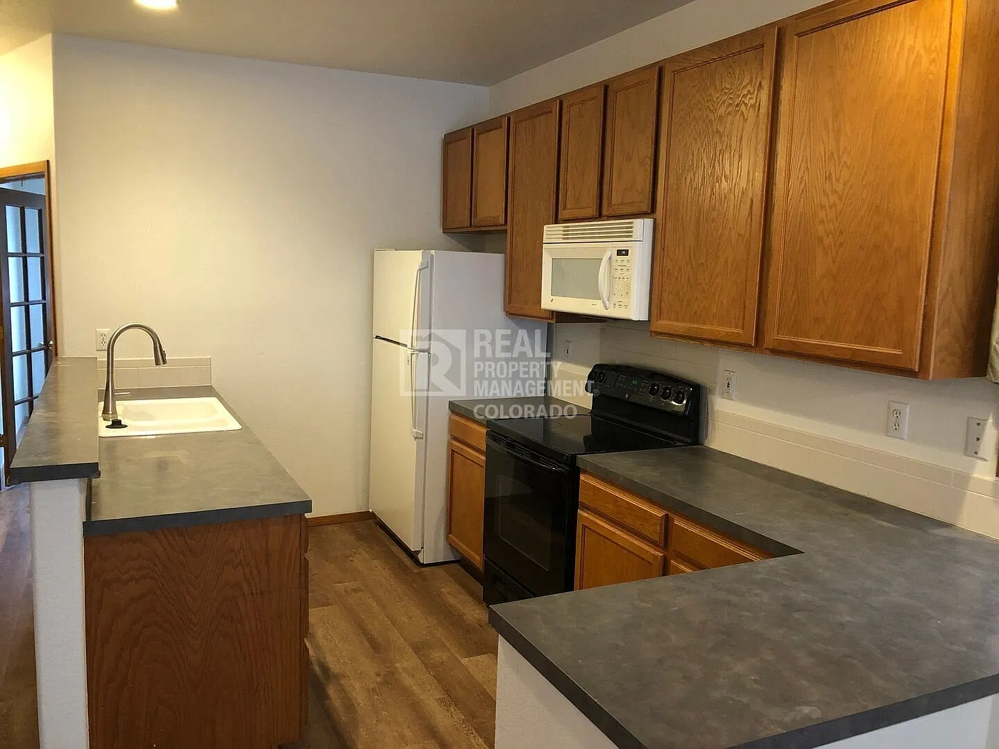 Spacious 2 Bed + 2 Offices | 2 Bath Duplex with Finished Basement, Fenced Yard & Garage in West L... — Photo 3