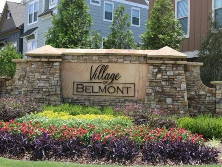 Gated community with pool, green space and dog park.