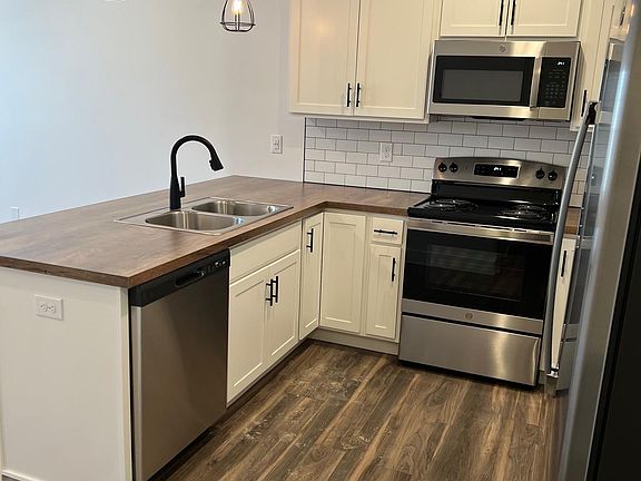 Full-equipped kitchen with stainless steel appliances
