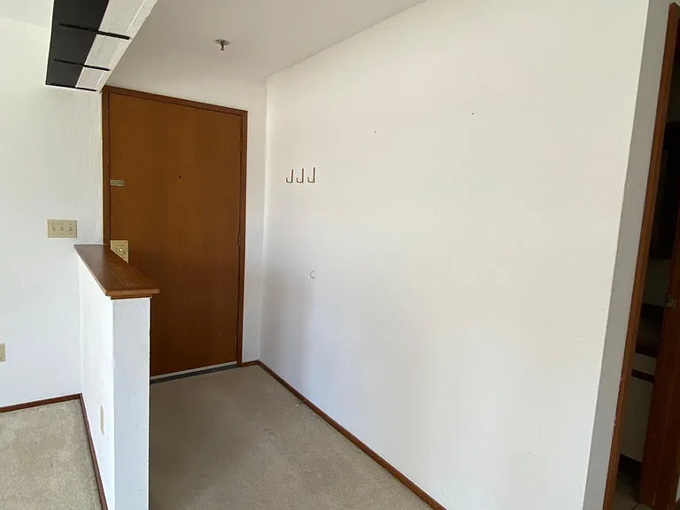Secure building with door access and telecom for package deliveries.