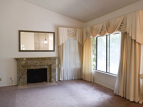 Living room with vaulted ceiling