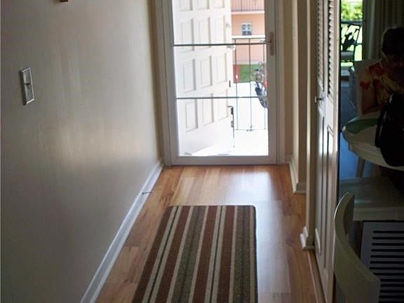 Enter into your foyer with laminate floor and entry doors