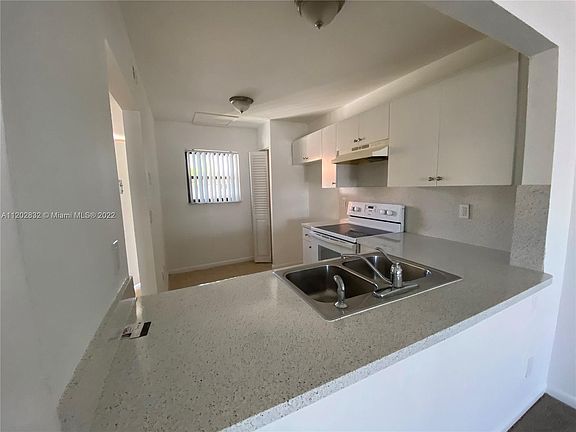 4th image of 901 NE 209th Ter #206-26