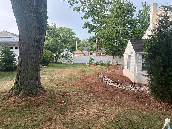 Yard with new river rock drain