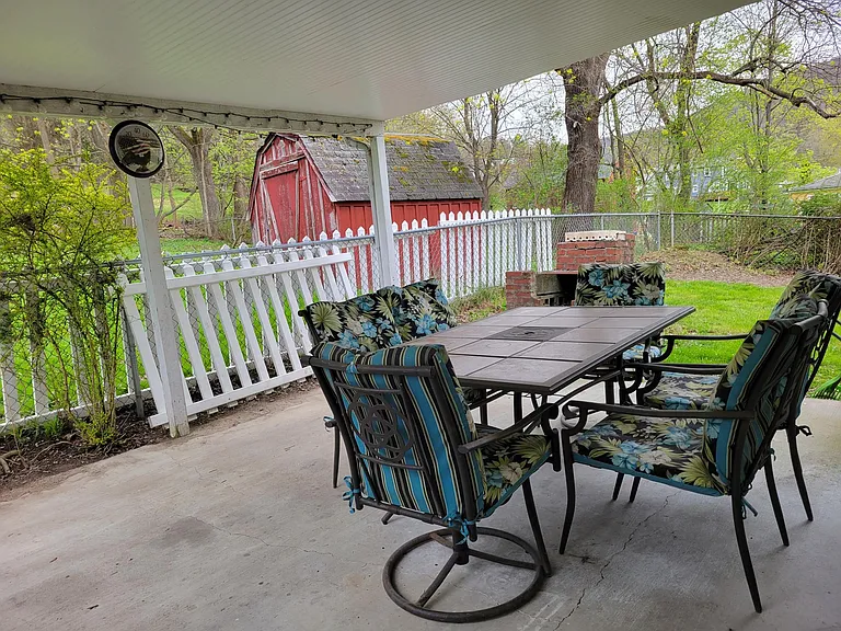 Fenced patio and side yard dedicated to your apartment. Patio covered so even enjoy under snow fall.