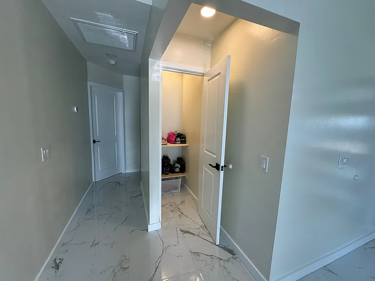 Shoe and jacket closet by main entrance