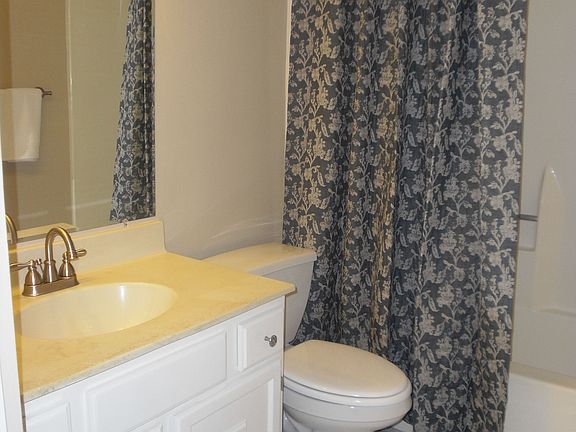 Each Bedroom has it's private bathroom. Plus a half bath near the laundry room