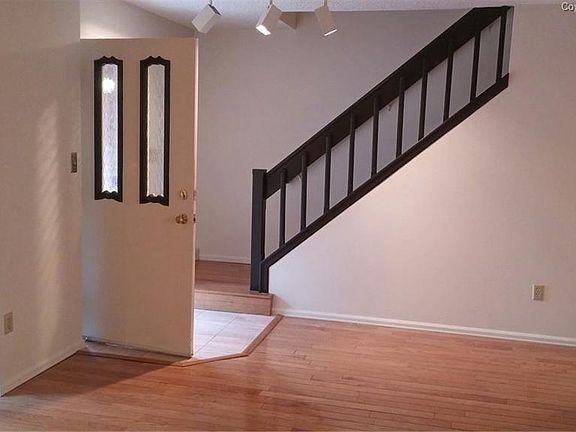 Entrance with Stairs to Upper Level Loft and Bedrooms