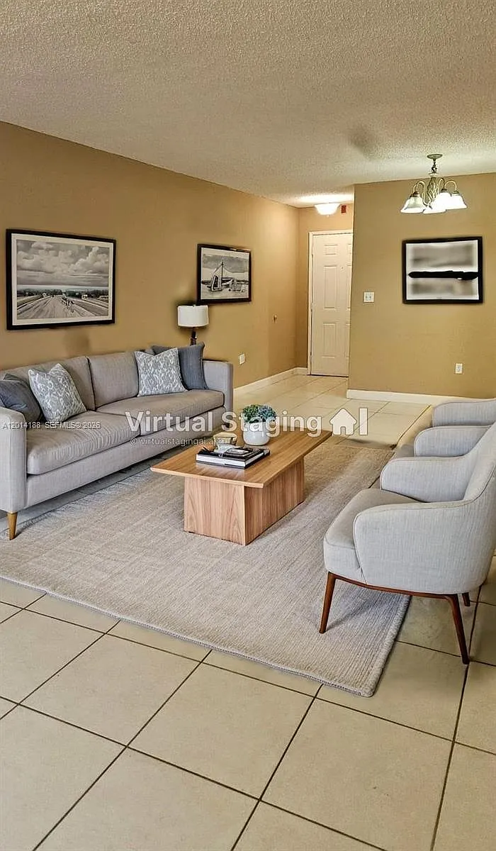 Building Photo - 6801 Harding Ave #217