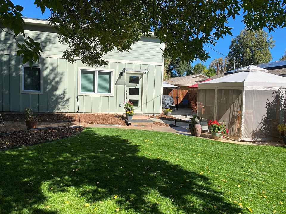 Front entry, gazebo, and yard area