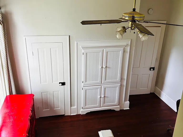 STAIRCASE LOCATED IN THE BACK OF THE HOUSE BY THE KITCHEN