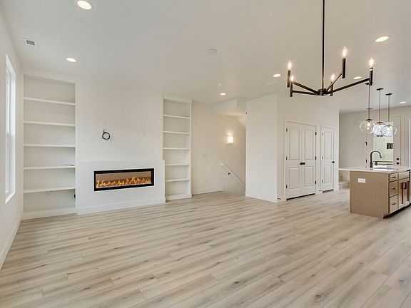 Living room with fireplace in a sego home