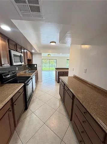 3167 Coral Springs Dr — Photo 2