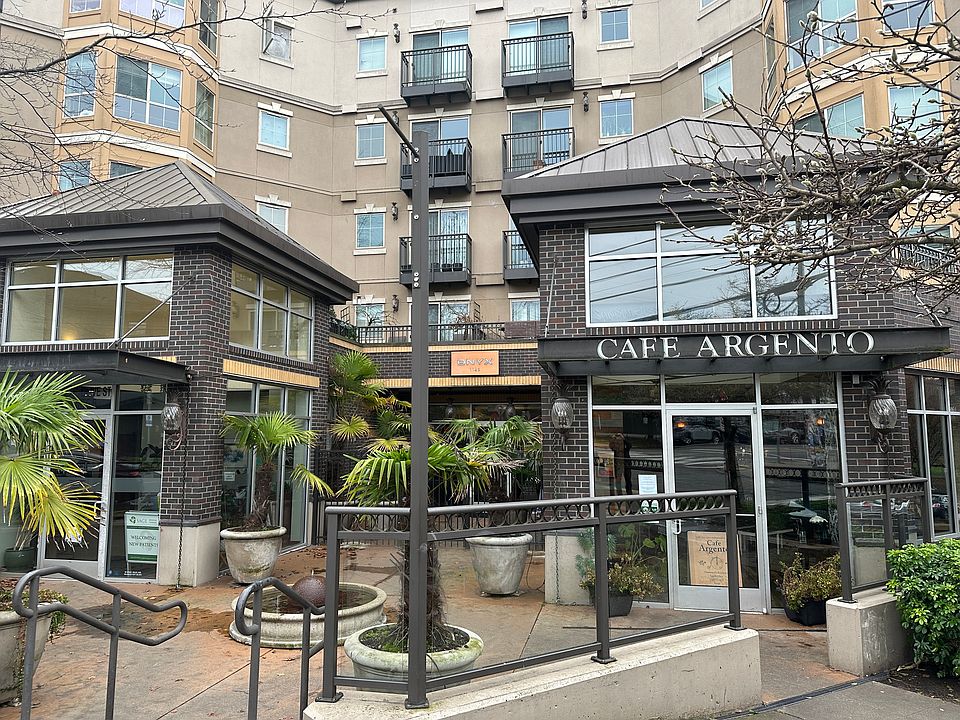 front entry with coffee shop at the right