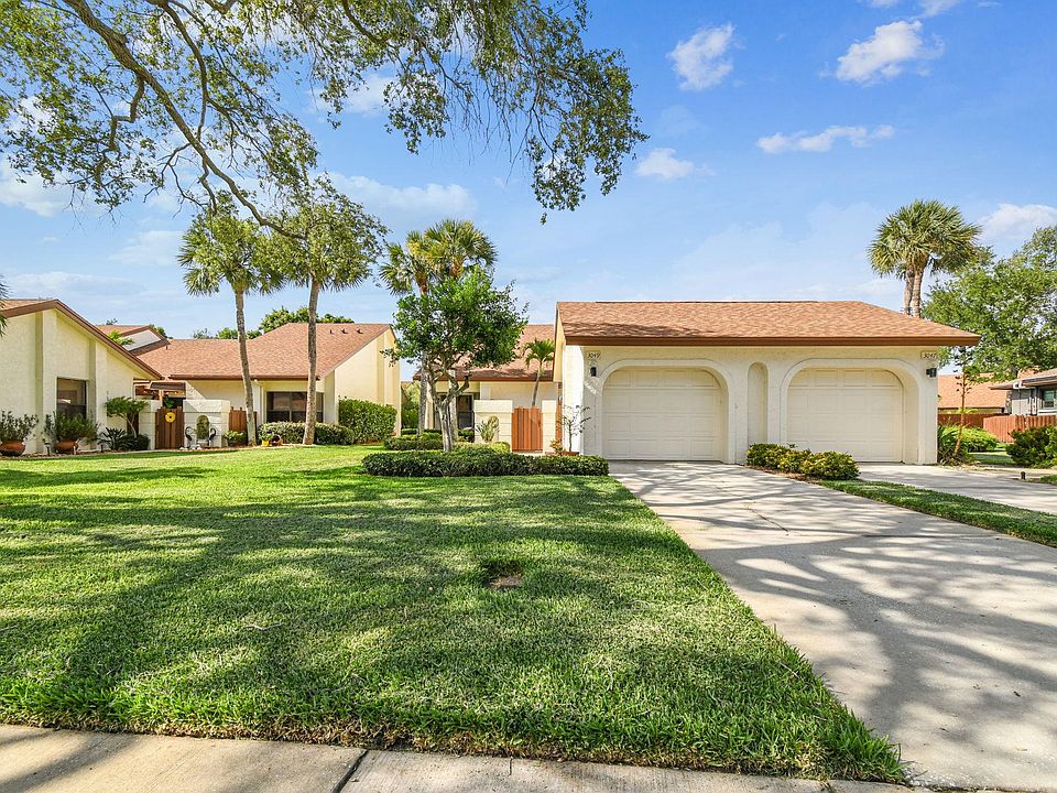 Left property with detached 1 car garage
