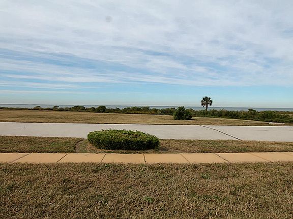 Incredible unobstructed north BAY VIEWS from this unique lot in the resort destination of Pointe West