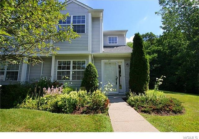 Beautiful bright and sunny end unit at Cedar Valley.  Condo living at its best