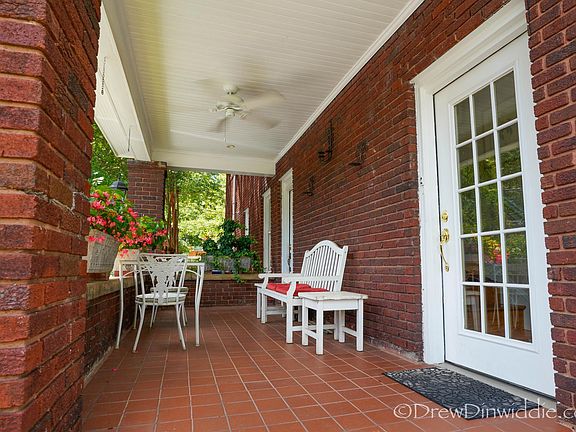 Shared porch on the left of the building to enter home