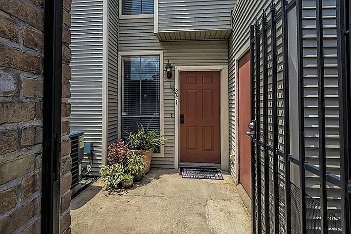 Gated front courtyard entrance.