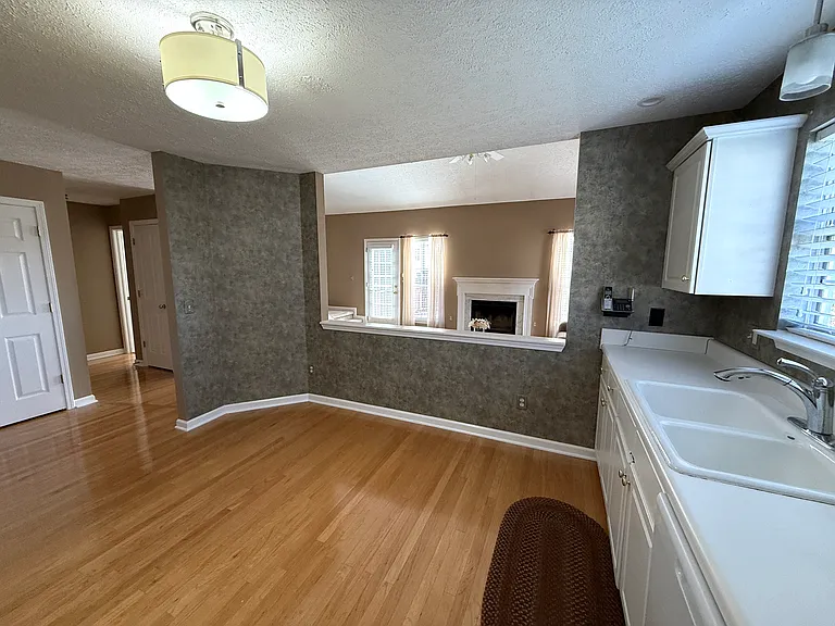 Kitchen, alternate view of living room