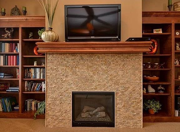 Perfect for those cold winter evenings.  Gas Fireplace with built-ins on each side.