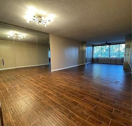 2nd image of 9491 N Belfort Cir #Q-305