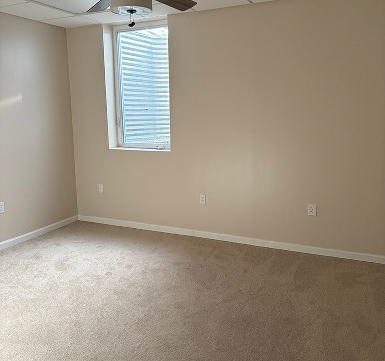 Bright spacious bedroom with egress window