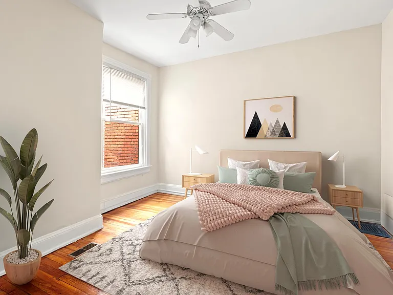 Bedroom 2. This image shows a virtually furnished space. Bedrooms come unfurnished.