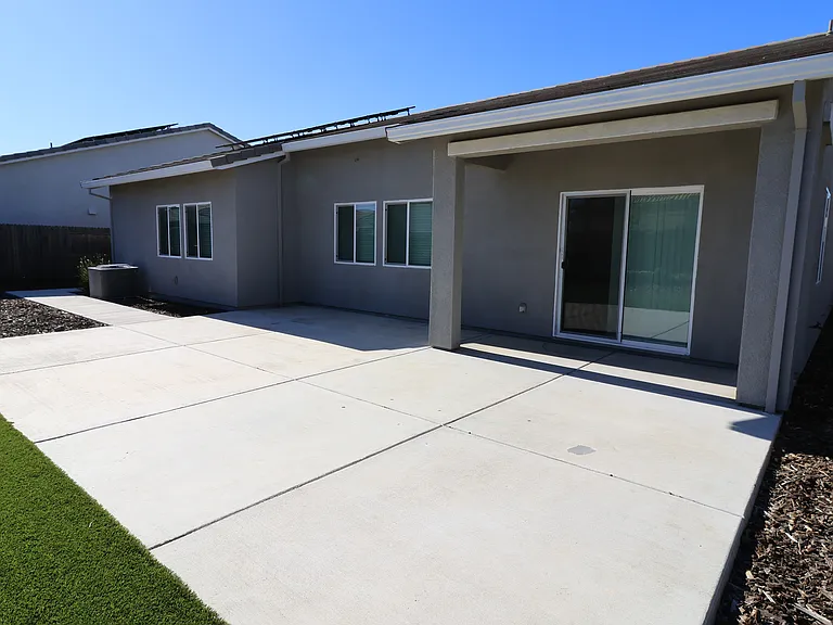 Large patio perfect for relaxing or entertaining.