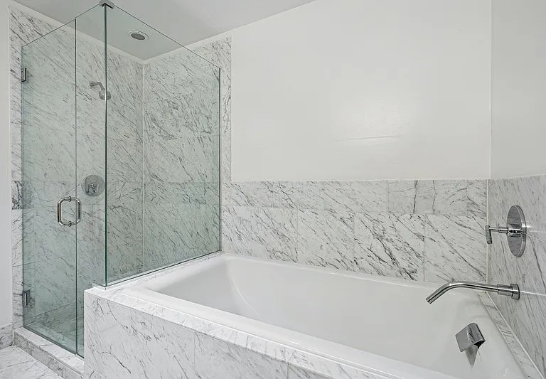 Indulge in luxury bathtime with Arbor's elegant marble bathroom features, combining modern architecture with serene design. Perfect for relaxation and rejuvenation. Schedule a tour today to see your future oasis!