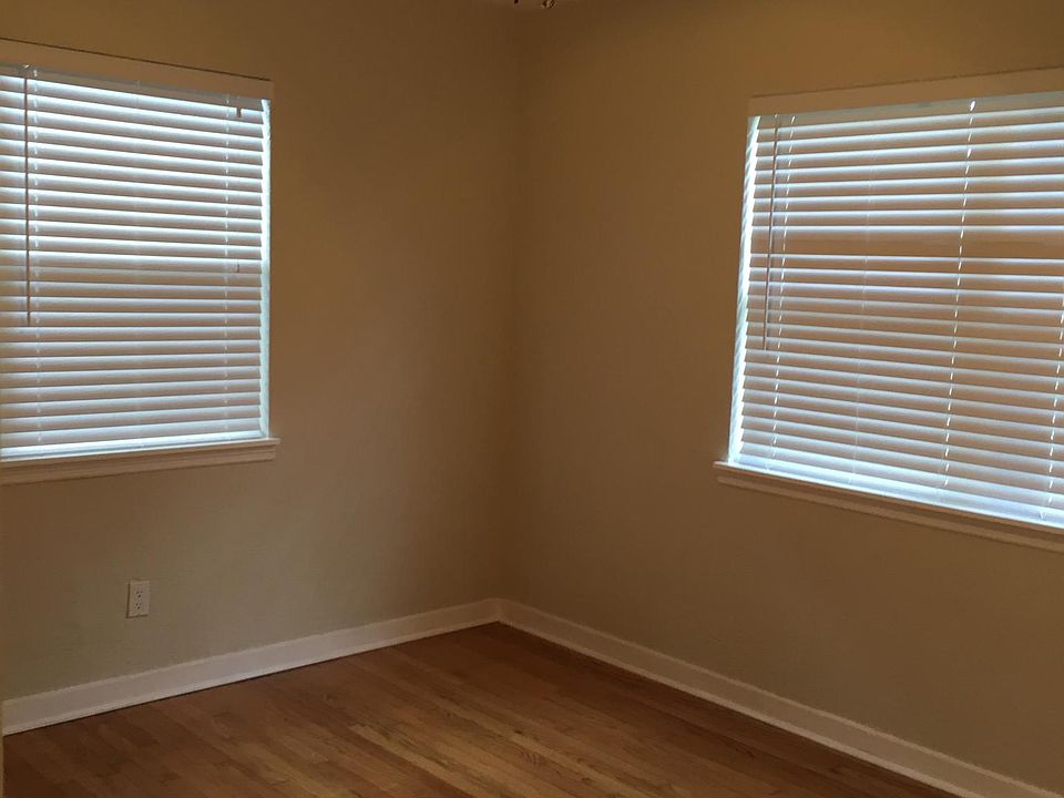 Both bedrooms about the same size. Each room has a ceiling fan.