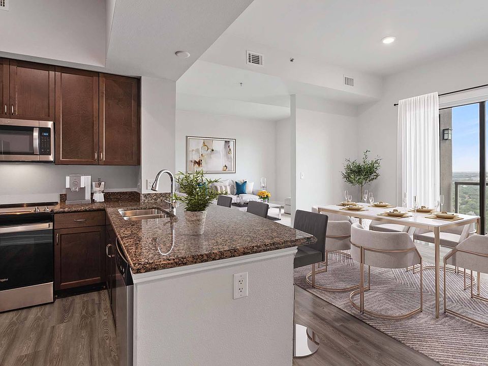 Create, host, and relax in this stunning kitchen with a view.