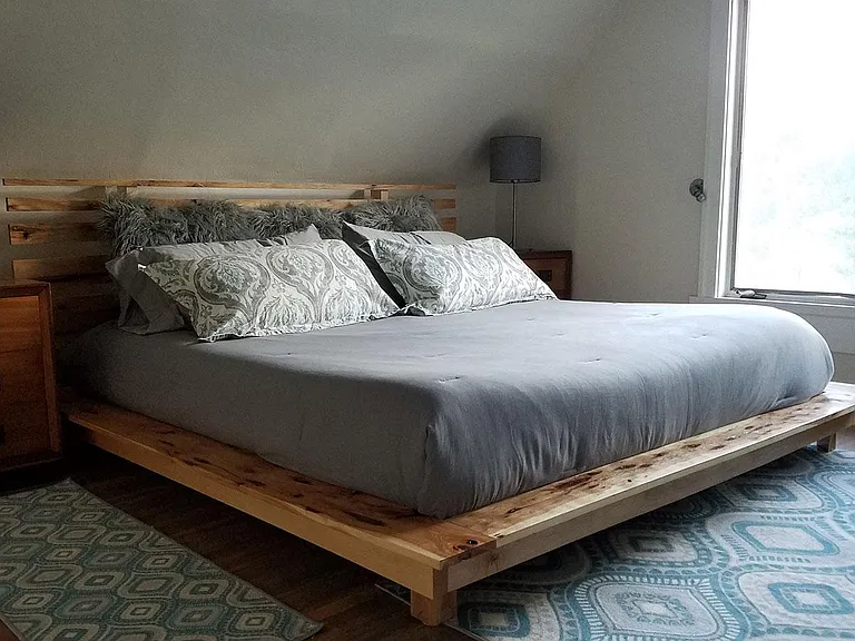 Upper Level Bedroom, West view, king size bed on custom-built frame.