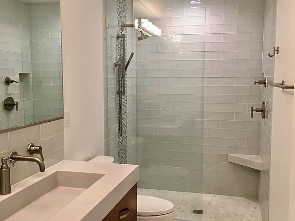 Upstairs bathroom with double shower head