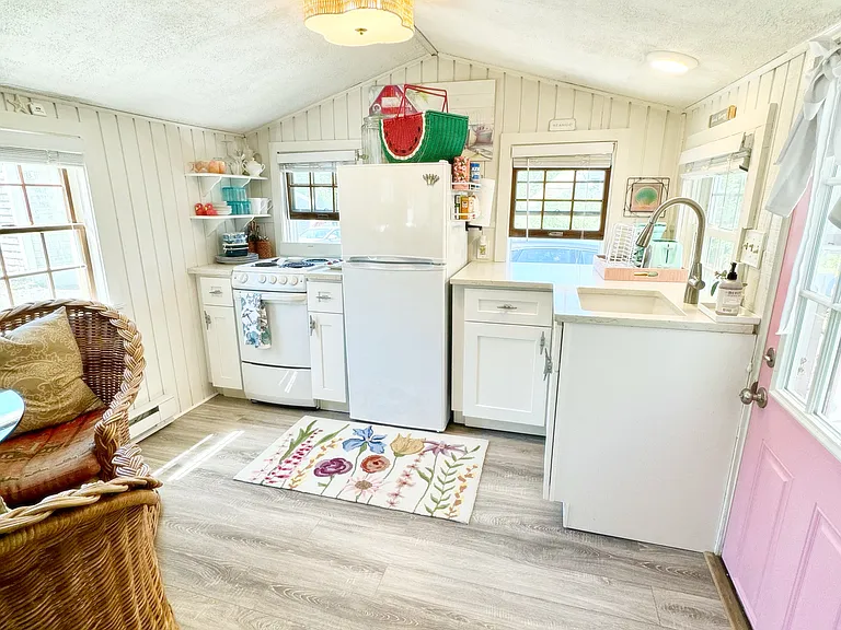 Kitchen with brand new fridge.