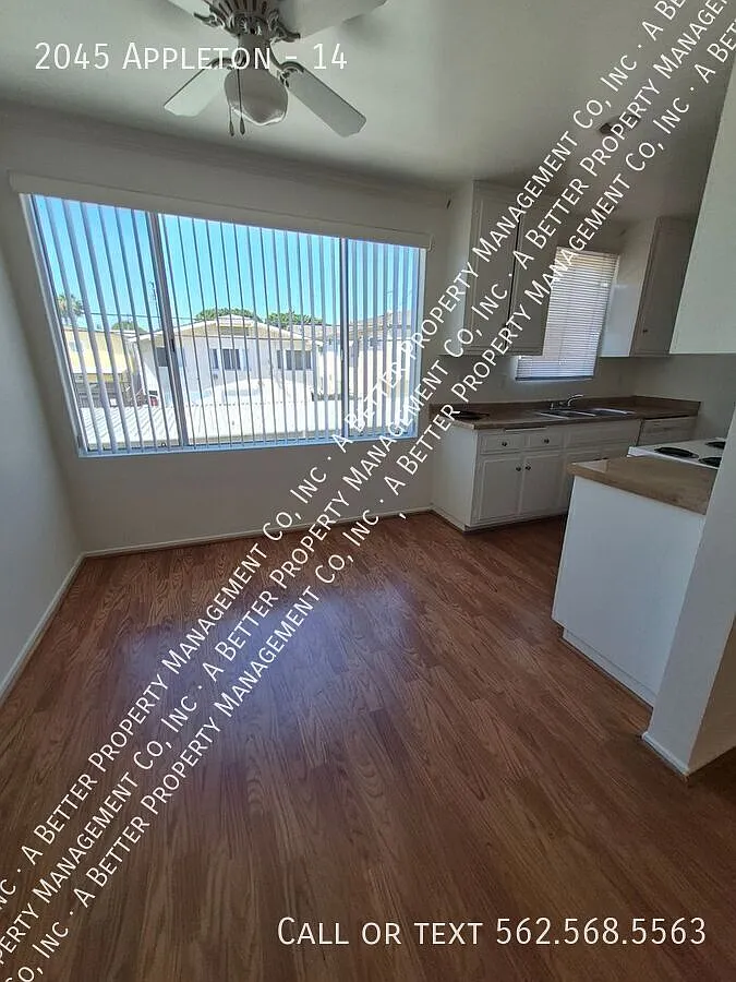 Bright Upper 1 Bed w/Modern Hardwood Laminate Floors, Dishwasher & Onsite Laundry in Gated Property! — Photo 2
