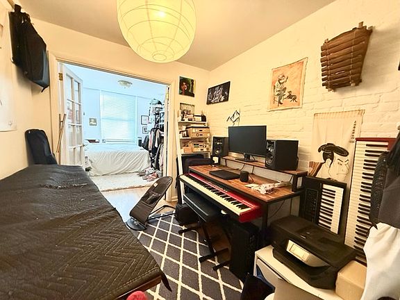 5th image of 303 E 10th St APT 1W