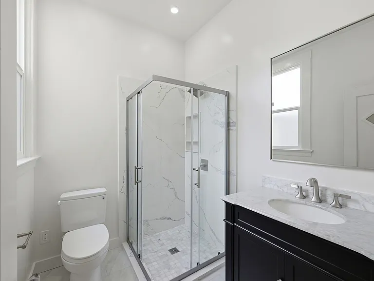 2nd updated bathroom with large vanity and shower