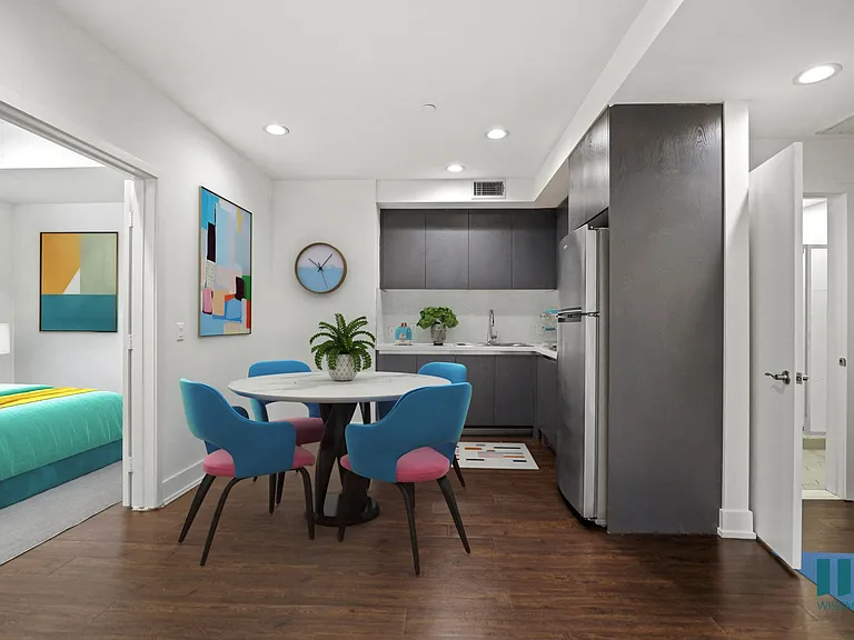 Kitchen, Dining, and Bedroom with Double-Doors