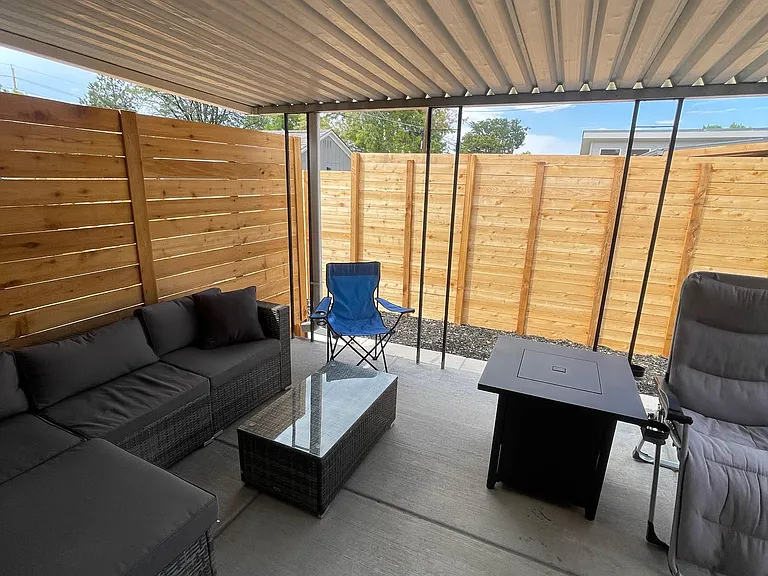 Private yard with covered patio seating