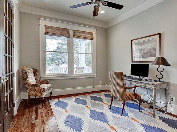 Sizable study that looks out over the front porch and yard. It has a large closet and full bath.