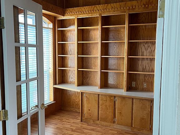 Office with Built-in Book Shelves and Desks